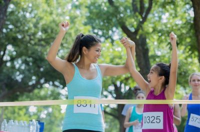 Mother and daughter at the finish line of a race