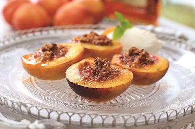 Baked peaches on plate