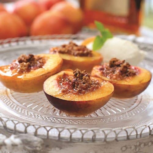 Baked peaches on plate