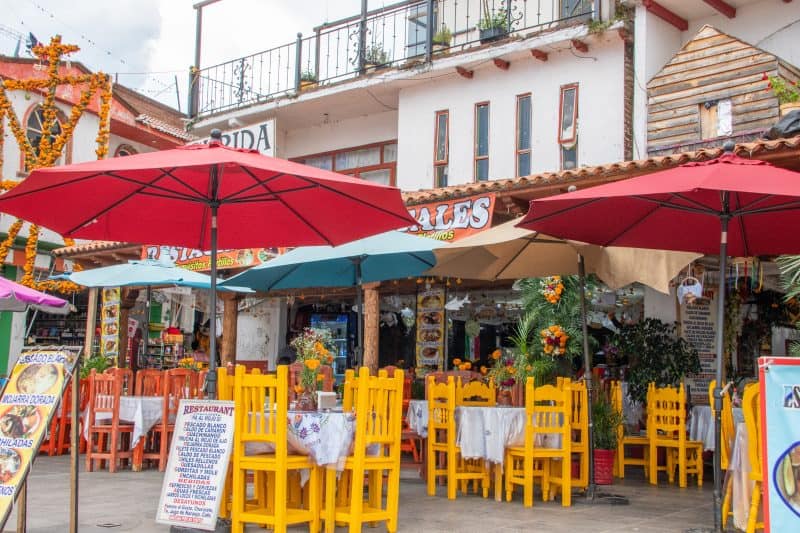 view of tables and umbrellas outside Mexican restaurant