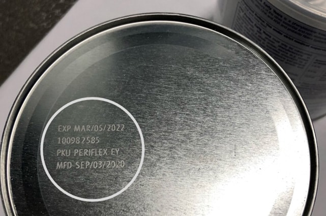 Bottom of can showing expiration date